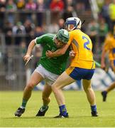 17 June 2018; Danny O’Leary of Limerick  in action against Jack Enright of Clare during the Electric Ireland Munster GAA Hurling Minor Championship Round 5 match between Clare and Limerick at Cusack Park in Ennis, Clare. Photo by Ray McManus/Sportsfile