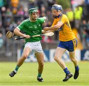 17 June 2018; Danny O’Leary of Limerick  in action against Jack Enright of Clare during the Electric Ireland Munster GAA Hurling Minor Championship Round 5 match between Clare and Limerick at Cusack Park in Ennis, Clare. Photo by Ray McManus/Sportsfile
