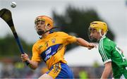 17 June 2018; Mike Gough of Clare in action against Cian Casey of Limerick during the Electric Ireland Munster GAA Hurling Minor Championship Round 5 match between Clare and Limerick at Cusack Park in Ennis, Clare. Photo by Ray McManus/Sportsfile