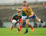17 June 2018; Ryan O'Donoghue of Mayo in action against Evan Flynn of Roscommon during the EirGrid Connacht GAA Football U20 Championship Final match between Mayo and Roscommon at Dr Hyde Park in Roscommon. Photo by Piaras Ó Mídheach/Sportsfile