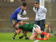 17 June 2018; Roscommon goalkeeper Aaron Brady is tackled by Jordan Flynn of Mayo during the EirGrid Connacht GAA Football U20 Championship Final match between Mayo and Roscommon at Dr Hyde Park in Roscommon. Photo by Piaras Ó Mídheach/Sportsfile