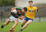 17 June 2018; Tommy Conroy of Mayo in action against Damien Duff of Roscommon during the EirGrid Connacht GAA Football U20 Championship Final match between Mayo and Roscommon at Dr Hyde Park in Roscommon. Photo by Piaras Ó Mídheach/Sportsfile