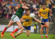 17 June 2018; Jordan Flynn of Mayo in action against Aidan Dowd of Roscommon during the EirGrid Connacht GAA Football U20 Championship Final match between Mayo and Roscommon at Dr Hyde Park in Roscommon. Photo by Piaras Ó Mídheach/Sportsfile
