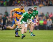 17 June 2018; Graeme Mulcahy of Limerick in action against Jack Browne of Clare during the Munster GAA Hurling Senior Championship Round 5 match between Clare and Limerick at Cusack Park in Ennis, Clare. Photo by Ray McManus/Sportsfile