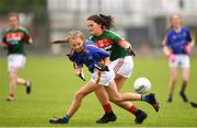 17 June 2018; Nora Martin of Tipperary in action against Clara Barrett of Mayo during the All-Ireland Ladies Football U14 B Final between Mayo and Tipperary at Duggan Park in Ballinasloe, Co. Galway. Photo by Harry Murphy/Sportsfile