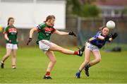 17 June 2018; Laura Moran of Mayo kicks a point under pressure from Aisling Ryan of Tipperary during the All-Ireland Ladies Football U14 B Final between Mayo and Tipperary at Duggan Park in Ballinasloe, Co. Galway. Photo by Harry Murphy/Sportsfile