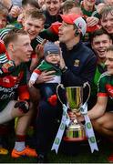 17 June 2018; Mayo manager Mike Solan covers the ears of his four month old son, Teddy, during loud celebrations after the EirGrid Connacht GAA Football U20 Championship Final match between Mayo and Roscommon at Dr Hyde Park in Roscommon. Photo by Piaras Ó Mídheach/Sportsfile