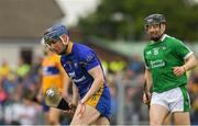 17 June 2018; Donal Tuohy of Clare in action against Graeme Mulcahy of Limerick during the Munster GAA Hurling Senior Championship Round 5 match between Clare and Limerick at Cusack Park in Ennis, Clare. Photo by Ray McManus/Sportsfile