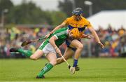 17 June 2018; Seamus Flanagan of Limerick in action against David McInerney of Clare during the Munster GAA Hurling Senior Championship Round 5 match between Clare and Limerick at Cusack Park in Ennis, Clare. Photo by Ray McManus/Sportsfile