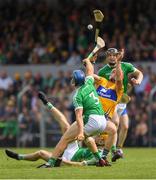 17 June 2018; John Conlon of Clare in action against Mike Casey of Limerick, 3, during the Munster GAA Hurling Senior Championship Round 5 match between Clare and Limerick at Cusack Park in Ennis, Clare. Photo by Ray McManus/Sportsfile