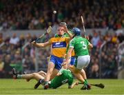 17 June 2018; John Conlon of Clare in action against Mike Casey of Limerick, 3, during the Munster GAA Hurling Senior Championship Round 5 match between Clare and Limerick at Cusack Park in Ennis, Clare. Photo by Ray McManus/Sportsfile