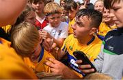 17 June 2018; Peter Duggan of Clare is surrounded by autograph hunters after the Munster GAA Hurling Senior Championship Round 5 match between Clare and Limerick at Cusack Park in Ennis, Clare. Photo by Ray McManus/Sportsfile