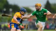 17 June 2018; Podge Collins of Clare in action against Richie English of Limerick during the Munster GAA Hurling Senior Championship Round 5 match between Clare and Limerick at Cusack Park in Ennis, Clare. Photo by Ray McManus/Sportsfile