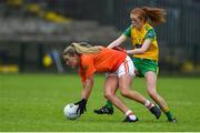 17 June 2018; Kelly Mallon of Armagh in action against Deirdre Foley of Donegal during the TG4 Ulster Ladies Football Senior Championship Final match between Armagh and Donegal at Brewster Park in Enniskillen, Co. Fermanagh. Photo by Daire Brennan/Sportsfile