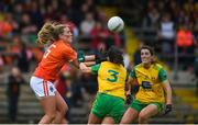 17 June 2018; Kelly Mallon of Armagh in action against Nicole McLaughlin of Donegal during the TG4 Ulster Ladies Football Senior Championship Final match between Armagh and Donegal at Brewster Park in Enniskillen, Co. Fermanagh. Photo by Daire Brennan/Sportsfile