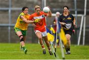 17 June 2018; Caroline O'Hanlon of Armagh in action against Aoife McDonnell of Donegal during the TG4 Ulster Ladies Football Senior Championship Final match between Armagh and Donegal at Brewster Park in Enniskillen, Co. Fermanagh. Photo by Daire Brennan/Sportsfile