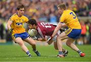 17 June 2018; Ian Burke of Galway in action against David Murray, left, and Peter Domican of Roscommon during the Connacht GAA Football Senior Championship Final match between Roscommon and Galway at Dr Hyde Park in Roscommon. Photo by Piaras Ó Mídheach/Sportsfile