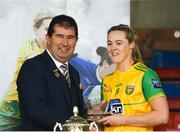 17 June 2018; Yvonne Bonner of Donegal is presented with the Player of the Game Award from Ulster LGFA President Michael Naughton after the TG4 Ulster Ladies Football Senior Championship Final match between Armagh and Donegal at Brewster Park in Enniskillen, Co. Fermanagh. Photo by Daire Brennan/Sportsfile