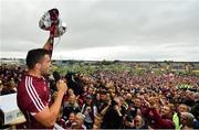 17 June 2018; Galway captain Damien Comer lifts The Nestor Cup following their victory in the Connacht GAA Football Senior Championship Final match between Roscommon and Galway at Dr Hyde Park in Roscommon. Photo by Ramsey Cardy/Sportsfile