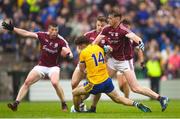 17 June 2018; Diarmuid Murtagh of Roscommon is fouled by Thomas Flynn, 9, and Eoghan Kerin of Galway which resulted in a Roscommon penalty during the Connacht GAA Football Senior Championship Final match between Roscommon and Galway at Dr Hyde Park in Roscommon. Photo by Ramsey Cardy/Sportsfile