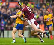 17 June 2018; Diarmuid Murtagh of Roscommon is fouled by Thomas Flynn, 9, and Eoghan Kerin of Galway which resulted in a Roscommon penalty during the Connacht GAA Football Senior Championship Final match between Roscommon and Galway at Dr Hyde Park in Roscommon. Photo by Ramsey Cardy/Sportsfile