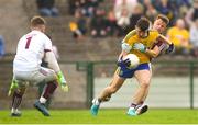 17 June 2018; Diarmuid Murtagh of Roscommon is tackled by Eoghan Kerin of Galway during the Connacht GAA Football Senior Championship Final match between Roscommon and Galway at Dr Hyde Park in Roscommon. Photo by Ramsey Cardy/Sportsfile