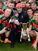 17 June 2018; Mayo manager Mike Solan with his son Teddy, 4 months old, during celebrations after the EirGrid Connacht GAA Football U20 Championship Final match between Mayo and Roscommon at Dr Hyde Park in Roscommon. Photo by Piaras Ó Mídheach/Sportsfile