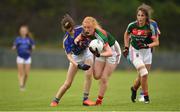 17 June 2018; Niamh O'Malley of Mayo in action against Aoife Dwyer of Tipperary during the All-Ireland Ladies Football U14 B Final between Mayo and Tipperary at Duggan Park in Ballinasloe, Co. Galway.  Photo by Harry Murphy/Sportsfile