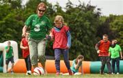 19 June 2018; Hanna Ciesielka, age 9, with SNA Ann Kelly during the visually impaired football training and match day at St Joseph's Primary School in Drumcondra, Dublin. Photo by David Fitzgerald/Sportsfile