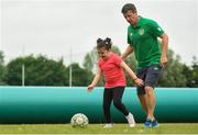 19 June 2018; Sophie O'Reilly, age 8, with FAI Football for All Development Officer Nick Harrsion during the visually impaired football training and match day at St Joseph's Primary School in Drumcondra, Dublin. Photo by David Fitzgerald/Sportsfile