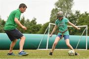 19 June 2018; Ella Murphy, age 13, with FAI Football for All Development Officer Nick Harrsion during the visually impaired football training and match day at St Joseph's Primary School in Drumcondra, Dublin. Photo by David Fitzgerald/Sportsfile
