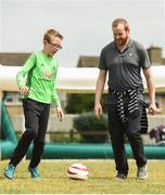 19 June 2018; Will Quinn, age 10, in action against Republic of Ireland Blind Footballer Paul Costello during the visually impaired football training and match day at St Joseph's Primary School in Drumcondra, Dublin. Photo by David Fitzgerald/Sportsfile