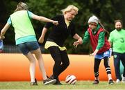 19 June 2018; Evelina Lutere, age 10, with her SNA Donna Williams in action against Ella Murphy, age 13, during the visually impaired football training and match day at St Joseph's Primary School in Drumcondra, Dublin. Photo by David Fitzgerald/Sportsfile