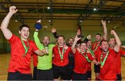 19 June 2018; Pedro Tavares of Futsambas Naas lifts the cup as his team-mates celebrate after the FAI Futsal Final match between Blue Magic and Futsambas Naas at Gormanstown College in Gormanstown, Co Meath. Photo by Matt Browne/Sportsfile