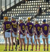 20 June 2018; Wexford players stand for the national anthem prior to the Bord Gáis Energy Leinster GAA Hurling U21 Championship Semi-Final match between Dublin and Wexford at Parnell Park in Dublin. Photo by David Fitzgerald/Sportsfile