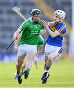 21 June 2018; Peter Casey of Limerick in action against Killian O’Dwyer of Tipperary during the Bord Gais Energy Munster Under 21 Hurling Championship Semi-Final match between Tipperary and Limerick at Semple Stadium in Thurles, Tipperary. Photo by Eóin Noonan/Sportsfile