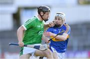 21 June 2018; Peter Casey of Limerick in action against Killian O’Dwyer of Tipperary during the Bord Gais Energy Munster Under 21 Hurling Championship Semi-Final match between Tipperary and Limerick at Semple Stadium in Thurles, Tipperary. Photo by Eóin Noonan/Sportsfile