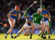 21 June 2018; Brian McGrath of Tipperary in action against Mark O'Dwyer of Limerick during the Bord Gais Energy Munster Under 21 Hurling Championship Semi-Final match between Tipperary and Limerick at Semple Stadium in Thurles, Tipperary. Photo by Eóin Noonan/Sportsfile