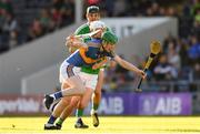21 June 2018; Paudie Feehan of Tipperary is tackled by Kyle Hayes of Limerick during the Bord Gais Energy Munster Under 21 Hurling Championship Semi-Final match between Tipperary and Limerick at Semple Stadium in Thurles, Tipperary. Photo by Eóin Noonan/Sportsfile