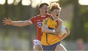 22 June 2018; Dermot Coughlan of Clare in action against Tadhg Corkery of Cork during the EirGrid Munster GAA Football U20 Championship semi-final match between Cork and Clare at Páirc Uí Rinn in Cork. Photo by Piaras Ó Mídheach/Sportsfile