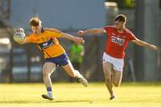 22 June 2018; Dermot Coughlan of Clare in action against Aidan Browne of Cork during the EirGrid Munster GAA Football U20 Championship semi-final match between Cork and Clare at Páirc Uí Rinn in Cork. Photo by Piaras Ó Mídheach/Sportsfile