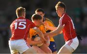 22 June 2018; Peter Collins of Clare in action against Damien Gore, left, and Seán O'Sullivan of Cork during the EirGrid Munster GAA Football U20 Championship semi-final match between Cork and Clare at Páirc Uí Rinn in Cork. Photo by Piaras Ó Mídheach/Sportsfile