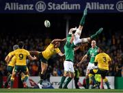 23 June 2018; Peter O’Mahony of Ireland falls after being tackled in the air by Israel Folau of Australia during the 2018 Mitsubishi Estate Ireland Series 3rd Test match between Australia and Ireland at Allianz Stadium in Sydney, Australia. Photo by Brendan Moran/Sportsfile