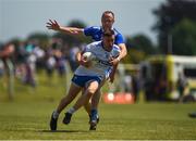 23 June 2018; Gavin Crotty of Waterford in action against Vinny Corey of Monaghan during the GAA Football All-Ireland Senior Championship Round 2 match between Waterford and Monaghan at Fraher Field in Dungarvan, Waterford. Photo by Daire Brennan/Sportsfile