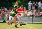 23 June 2018; Ciara O'Sullivan of Cork scores her side's fourth goal of the game despite the efforts of Eilis Lynch of Kerry during the TG4 Munster Ladies Senior Football Final match between Cork and Kerry at CIT in Bishopstown, Cork. Photo by Eóin Noonan/Sportsfile