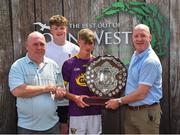 23 June 2018; First-place in the Boys Hurling competition Luke Roche from Shelmaliers GAA Club in Co. Wexford, centre, is presented with the Peadar Aherne Trophy, by sons of Peadar Ahearn Conor, left, Shane, right, and grandson Aaron, at the John West Skills Day in the National Sports Campus on Saturday 23rd June. The Skills Day is an opportunity for Ireland’s rising football, hurling & camogie stars to show their skills as part of the John West Féile na nÓg and John West Féile na nGael competitions. At the National Sports Campus in Blanchardstown, Dublin. Photo by Seb Daly/Sportsfile