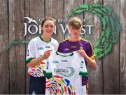 23 June 2018; Luke Roche from Shelmaliers GAA Club in Co. Wexford pictured with Dublin Camogie player Eve O'Brien at the John West Skills Day in the National Sports Campus on Saturday 23rd June. The Skills Day is an opportunity for Ireland’s rising football, hurling & camogie stars to show their skills as part of the John West Féile na nÓg and John West Féile na nGael competitions. At the National Sports Campus in Blanchardstown, Dublin. Photo by Seb Daly/Sportsfile