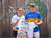 23 June 2018; Brian Gleeson from Loughmore Castleiney GAA Club in Co. Tipperary pictured with Dublin Camogie player Eve O'Brien at the John West Skills Day in the National Sports Campus on Saturday 23rd June. The Skills Day is an opportunity for Ireland’s rising football, hurling & camogie stars to show their skills as part of the John West Féile na nÓg and John West Féile na nGael competitions. At the National Sports Campus in Blanchardstown, Dublin. Photo by Seb Daly/Sportsfile