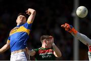 23 June 2018; Michael Quinlivan of Tipperary punches the ball past Paddy Durcan of Mayo and ultimately to the net for a goal in the 10th minute of the GAA Football All-Ireland Senior Championship Round 2 match between Tipperary and Mayo at Semple Stadium in Thurles, Tipperary. Photo by Ray McManus/Sportsfile