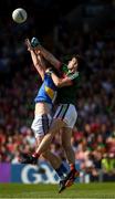 23 June 2018; Conor Sweeney of Tipperary in action against Ger Cafferkey of Mayo during the GAA Football All-Ireland Senior Championship Round 2 match between Tipperary and Mayo at Semple Stadium in Thurles, Tipperary. Photo by Ray McManus/Sportsfile